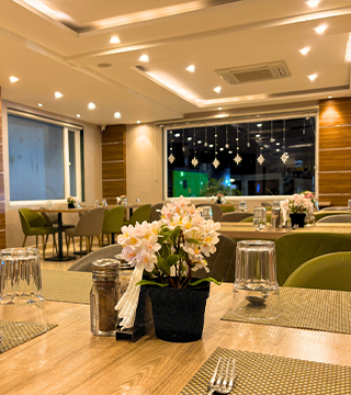  dining area at Sharda Residency restaurant