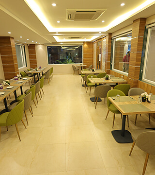 Restaurant interior with stylish décor, neatly arranged tables